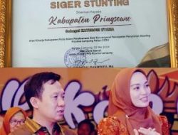 Pj. Bupati Pringsewu Terima Penghargaan Aksi Konvergensi Penurunan Stunting
